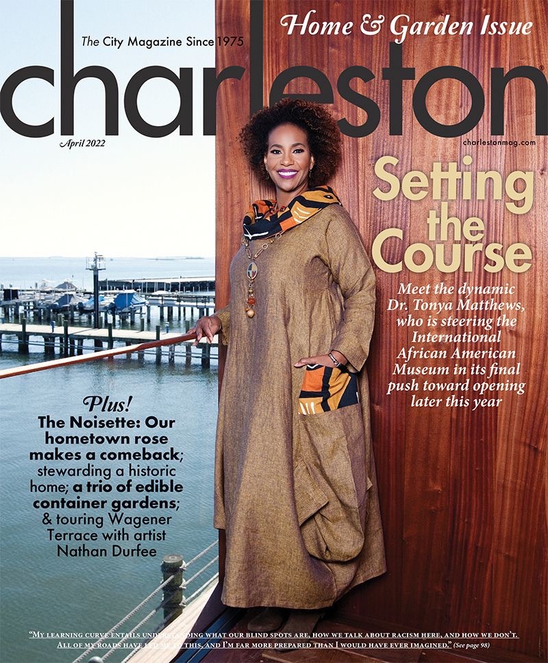 A black woman standing on a boat on the cover the April 2022 Charleston Magazine